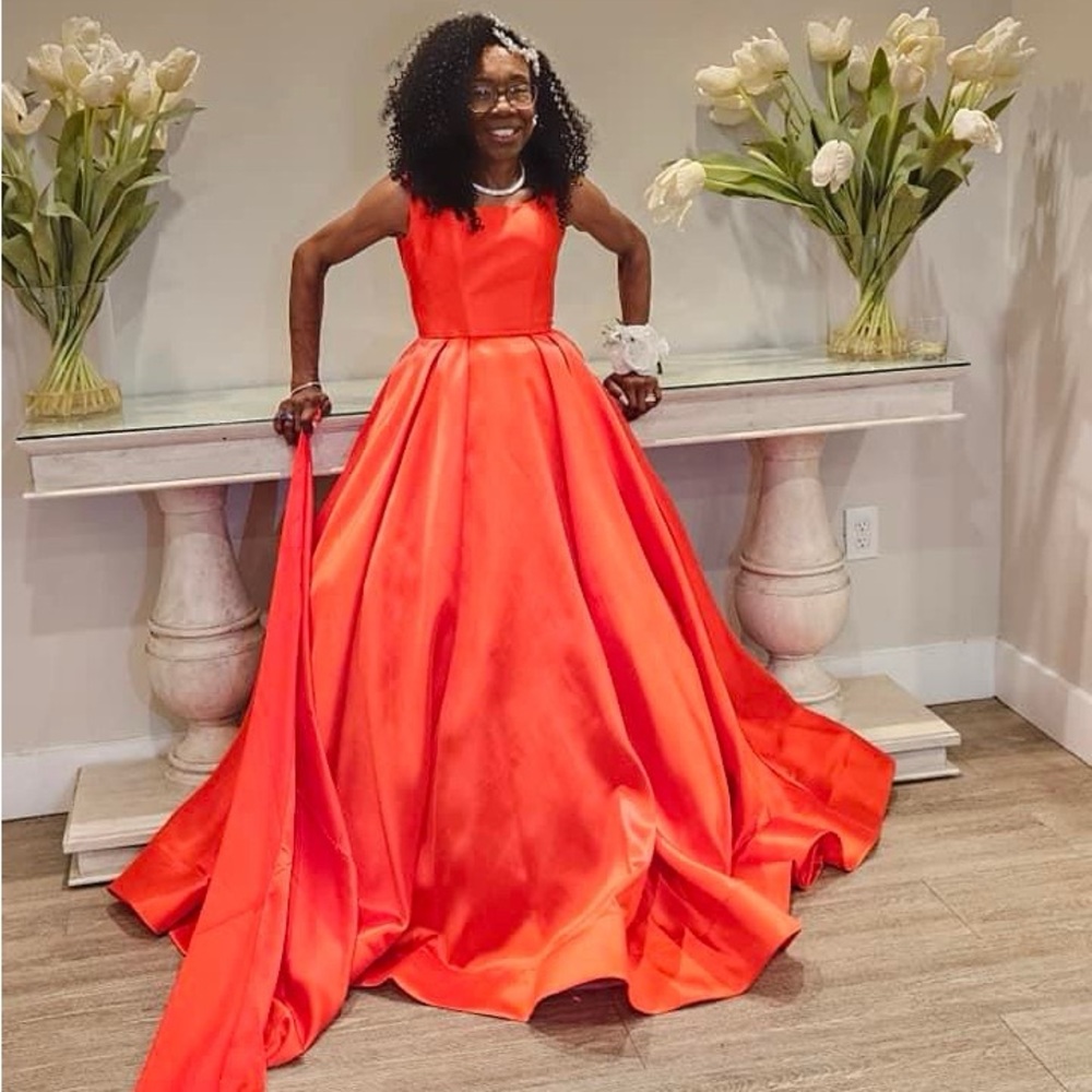 Red formal gown, size:0, no alterations. Mother of Bride wore 2hrs.